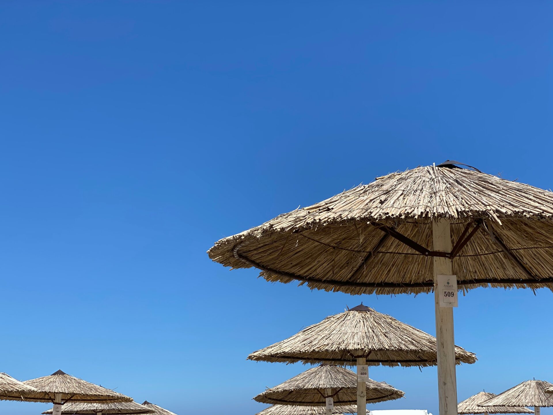 Native canopies - beach umbrellas - beach in Greece