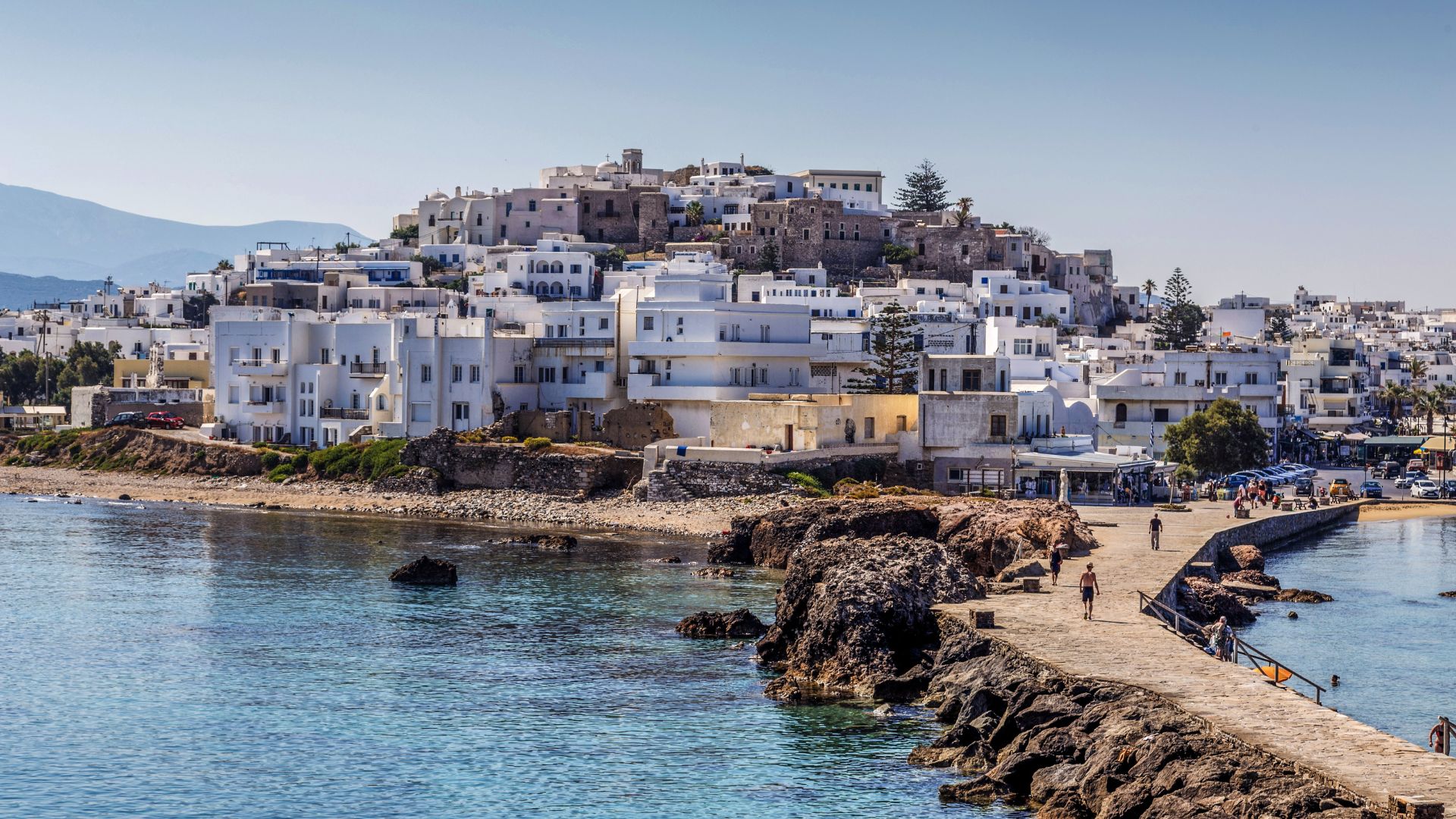White buildings and the Aegan sea at Naxos Town, Greece.
