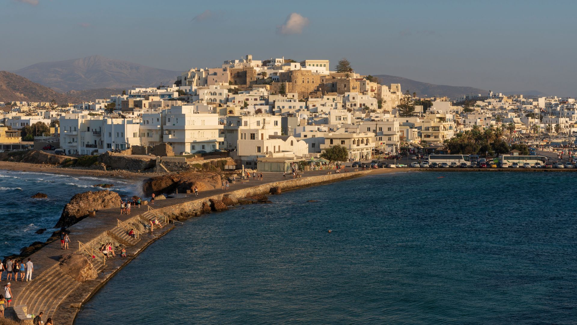 Kastro castle on Naxos island, Greece, with white-washed buildings, and featuring the Aegean Sea.