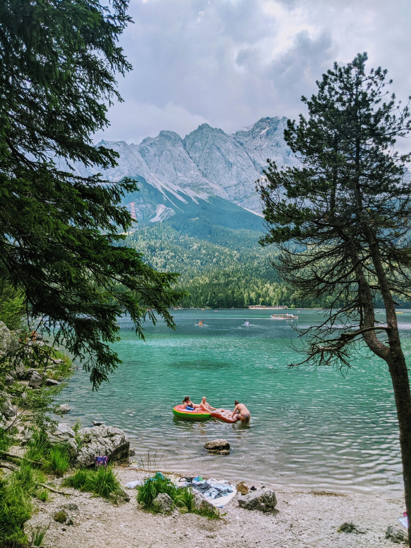 People swimming in the turquoise waters of Lake Eibsee 