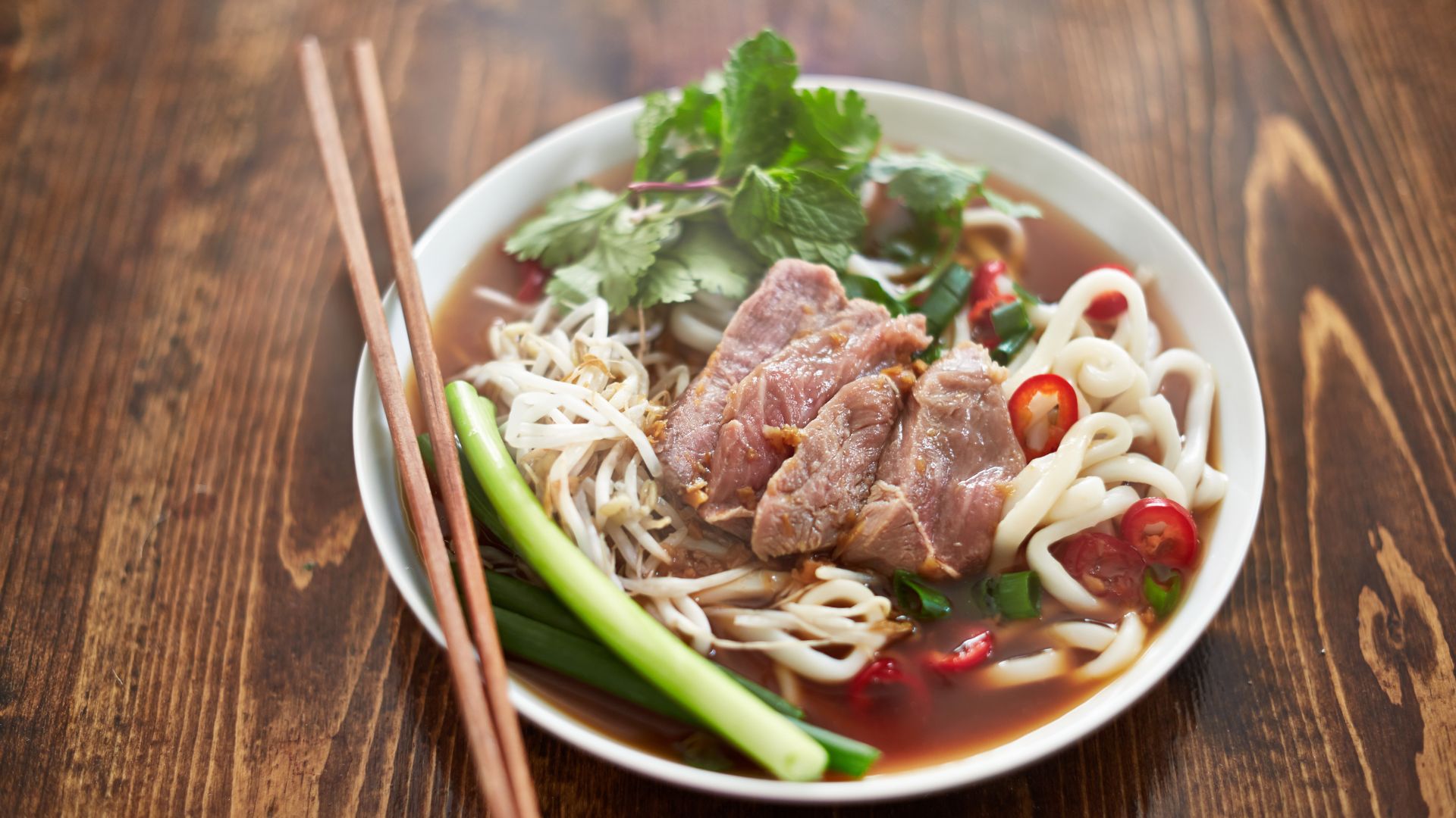 A bowl of Pho, a Vietnamese soup dish.