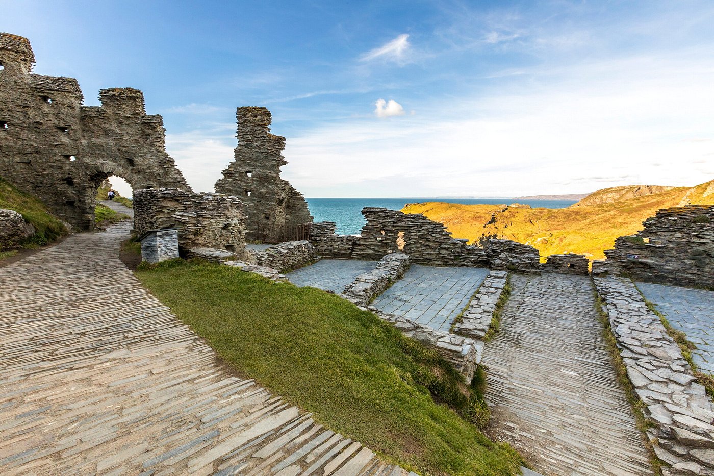 Ruins of Tintagel Castle perched on a rugged coastal cliff