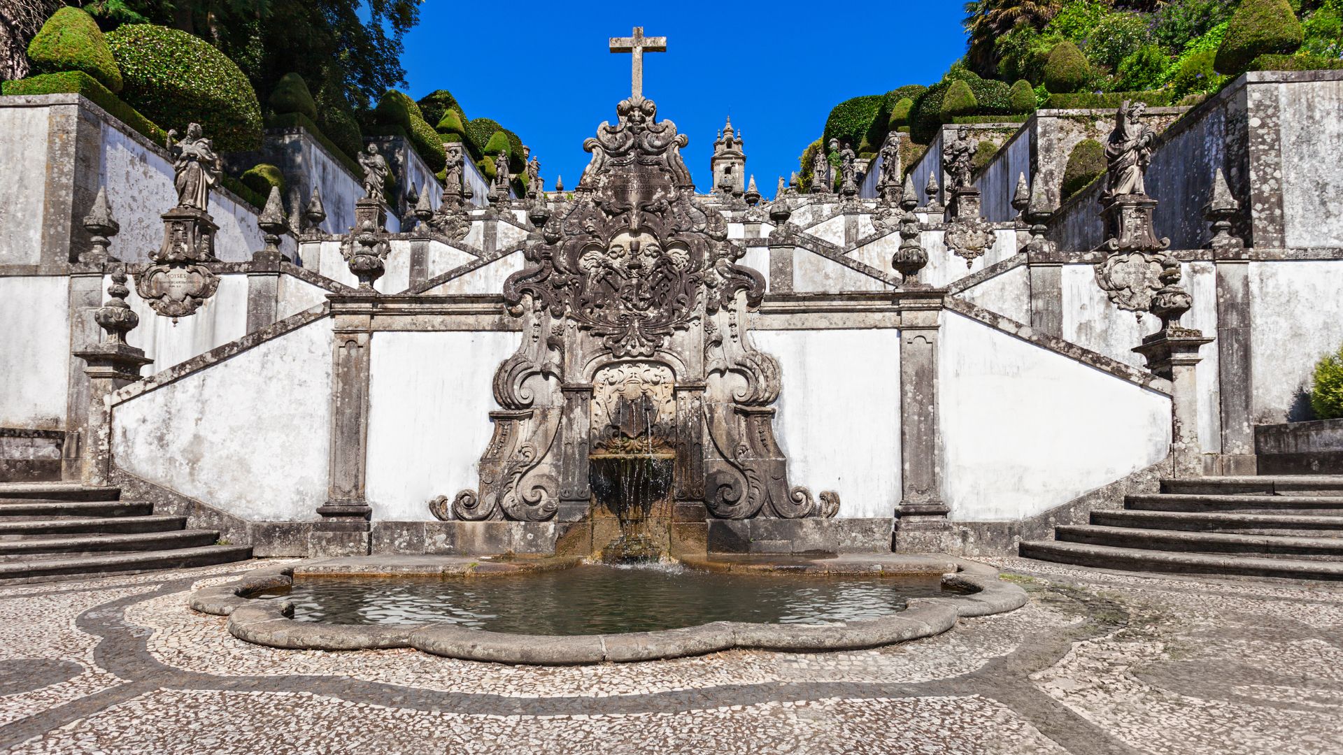 A monumental Baroque staircase and fountain at the Sanctuary of Bom Jesus do Monte in Braga, Portugal.