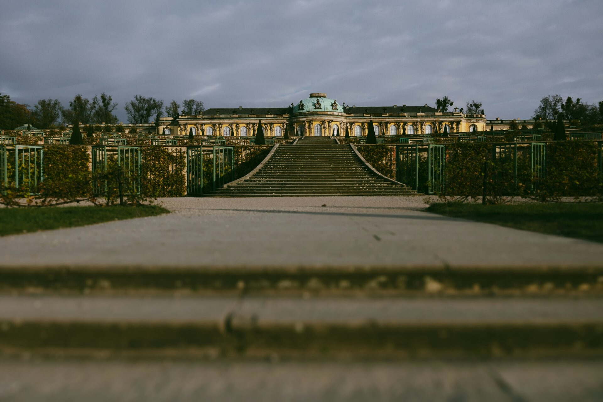 Front view of Sanssouci Palace with yellow façade