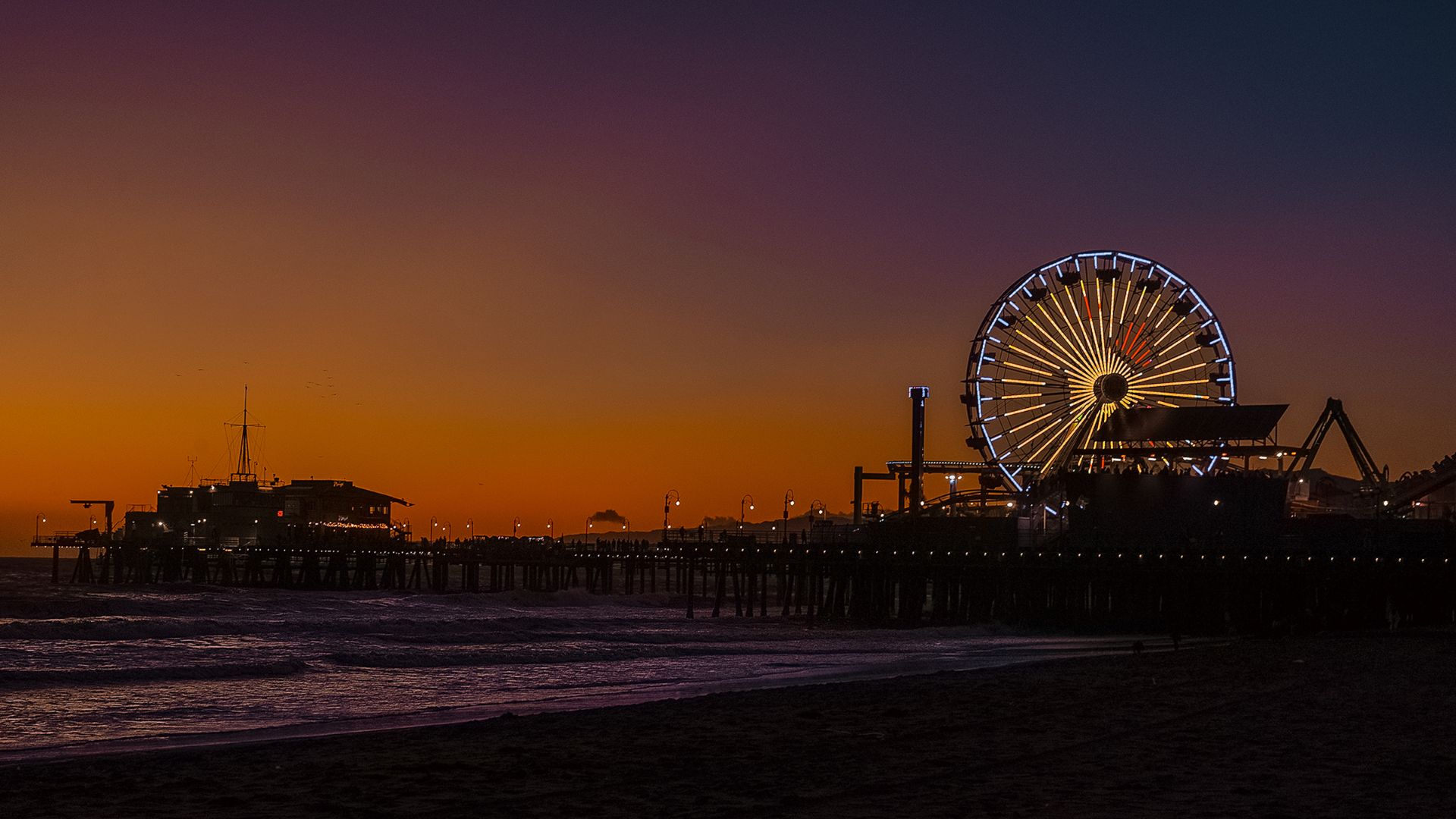 Sunset at Santa Monica Pier in Santa Monica, California.