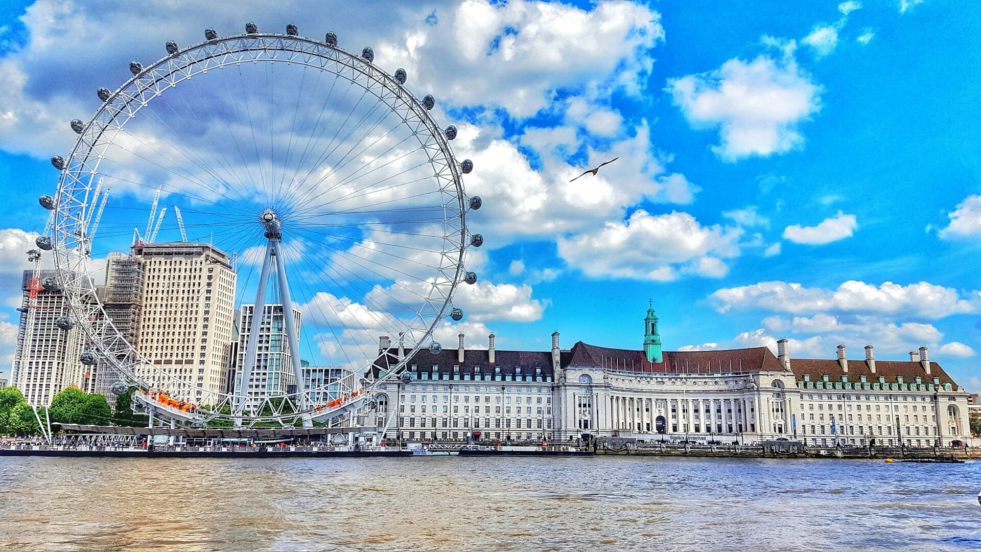 A transparent capsule of the London Eye in daylight