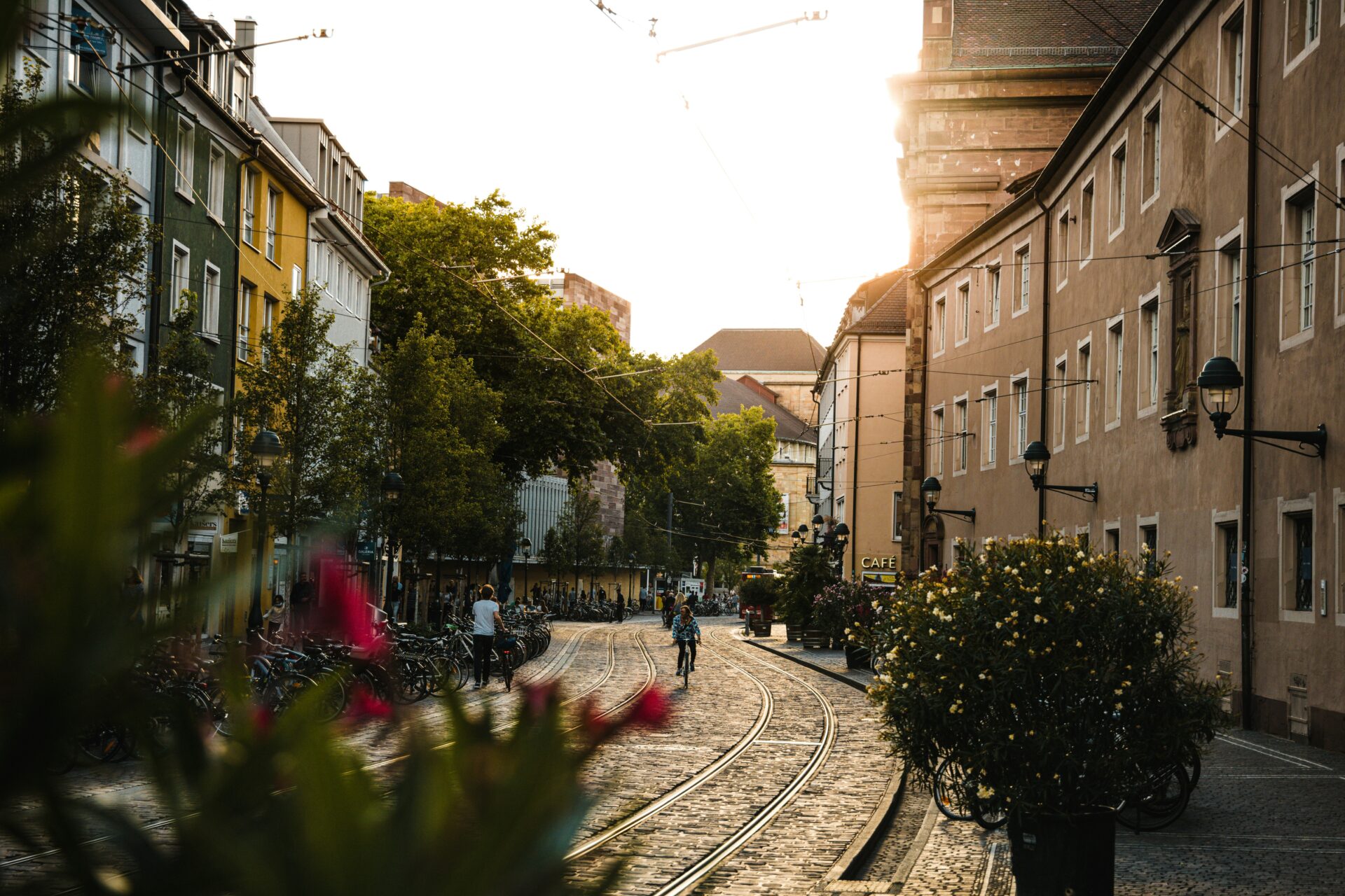 Tram rail tracks running through a sunny street in Freiburg im Breisgau