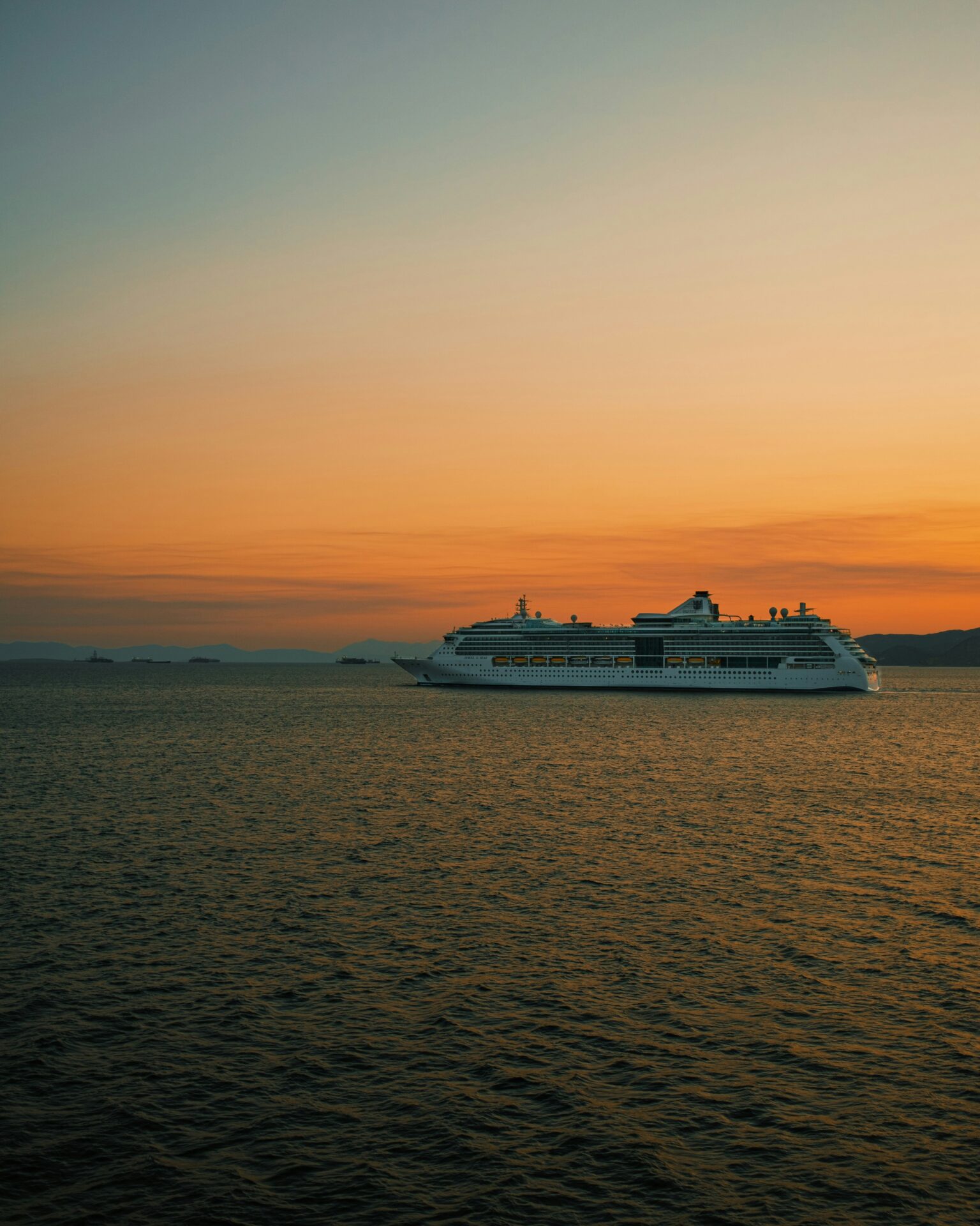Vessel or ferry with a sunset backdrop