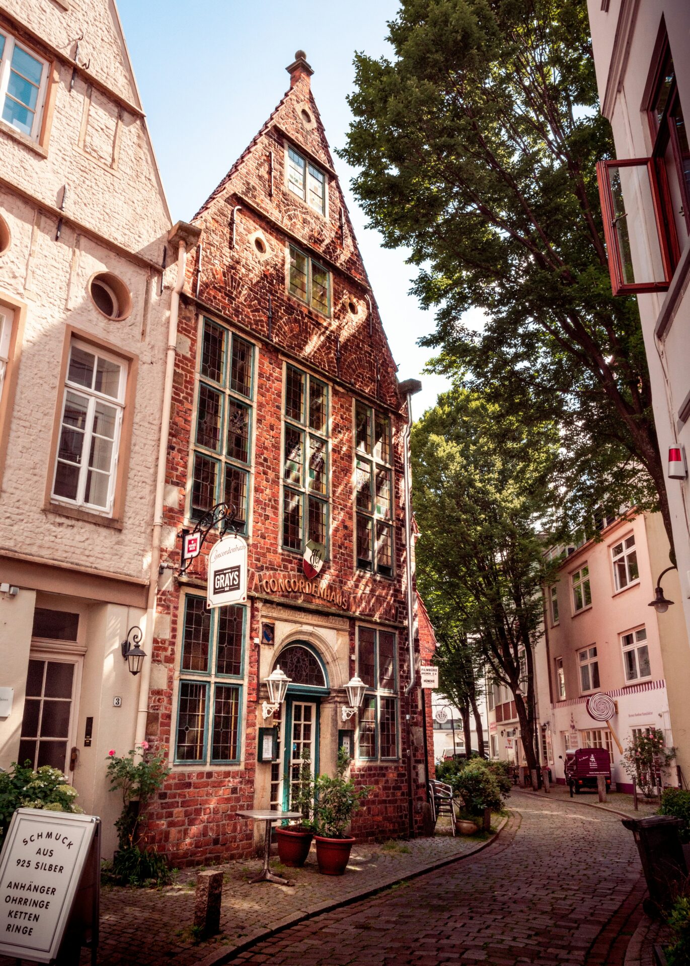Charming street in Bremen lined with historic buildings and cobblestones