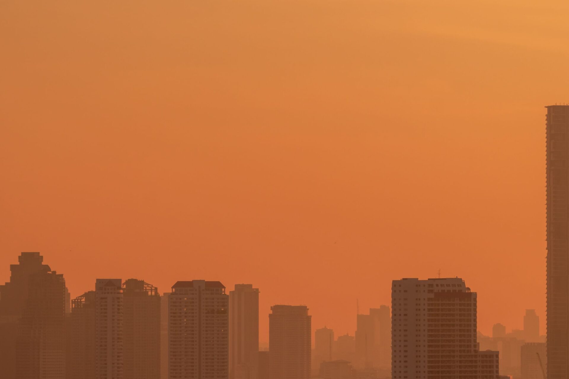 Buildings with fine layer of tan dust
