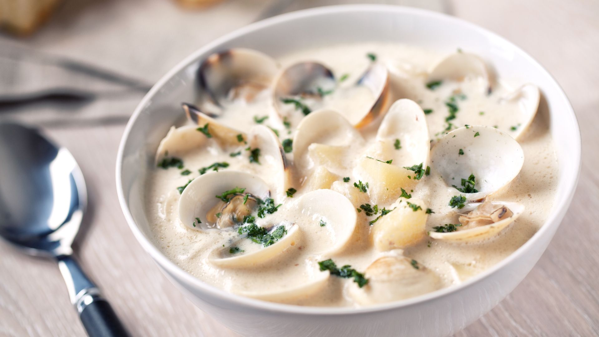 Clam chowder is a creamy, thickened seafood soup containing clams, diced potatoes.