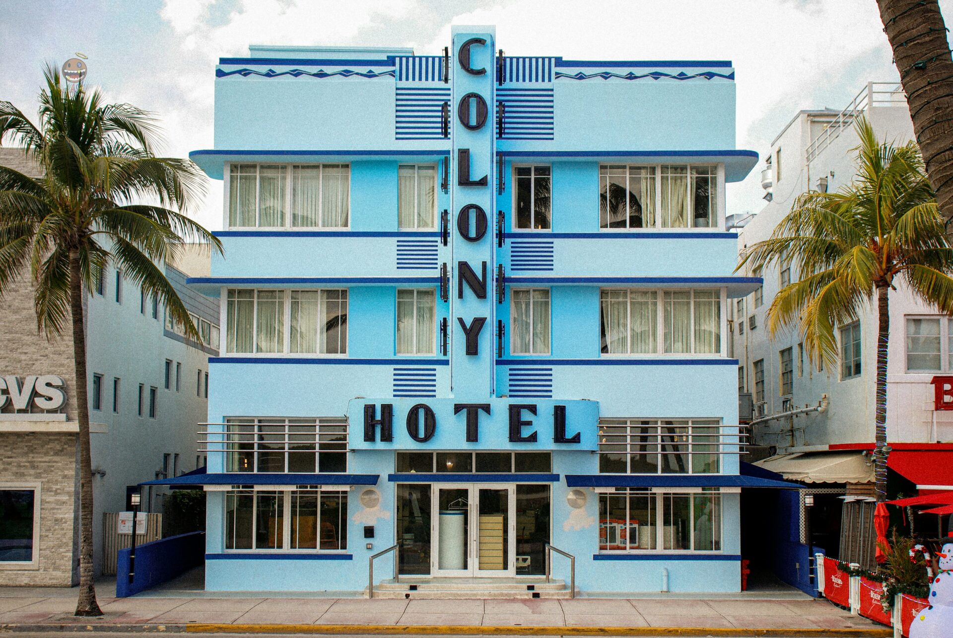 A pastel-colored Art Deco hotel