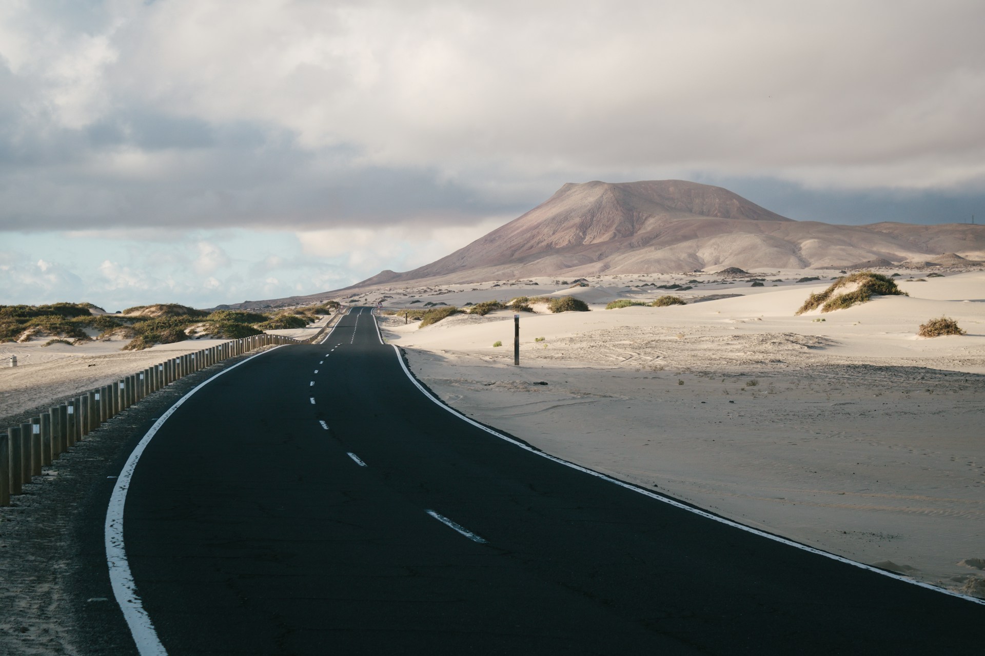  A paved road cutting through the Corralejo dunes