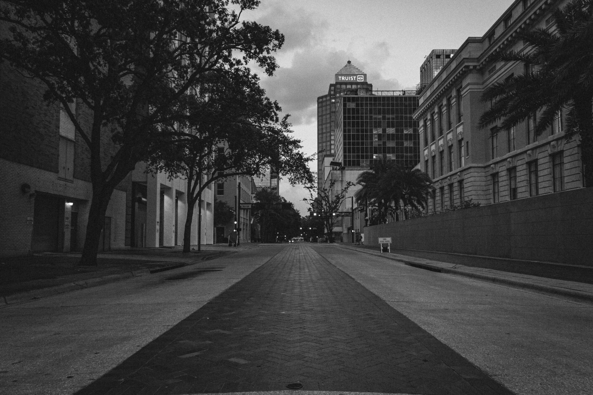 Quiet Tampa street with no cars or pedestrians, surrounded by downtown architecture