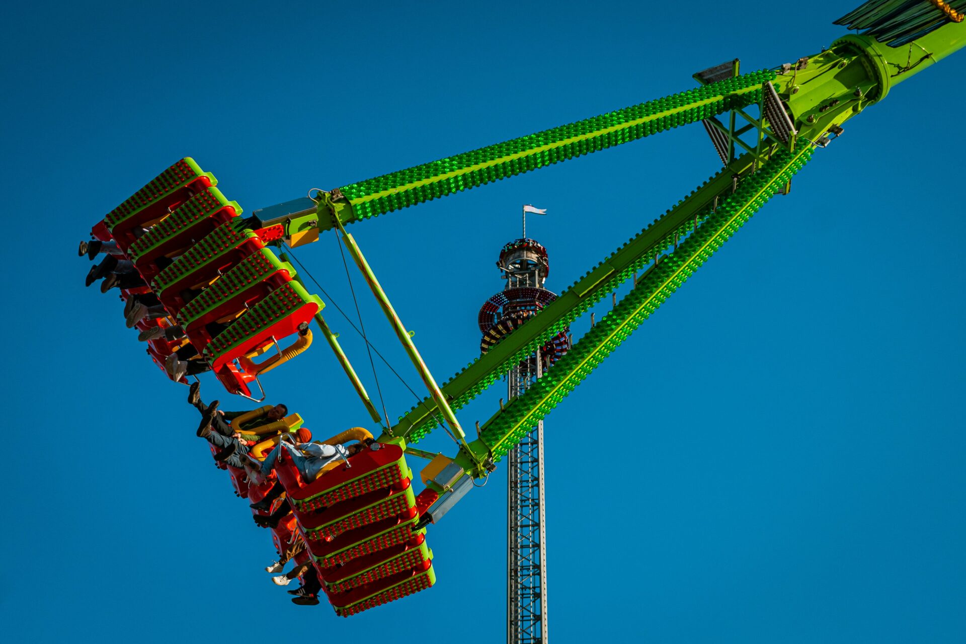 Daytime view of Bremen's Freimarkt with colorful carnival rides