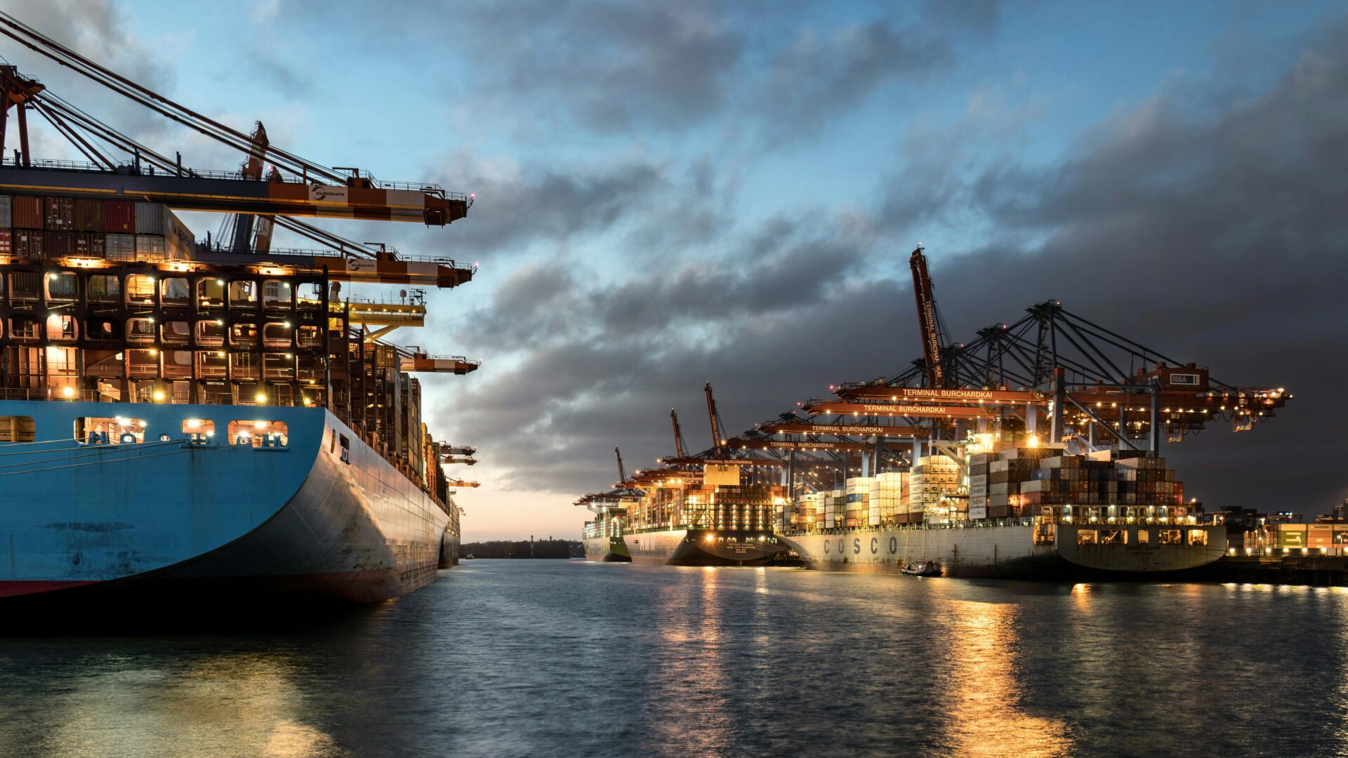 The bustling Port of Hamburg at dusk