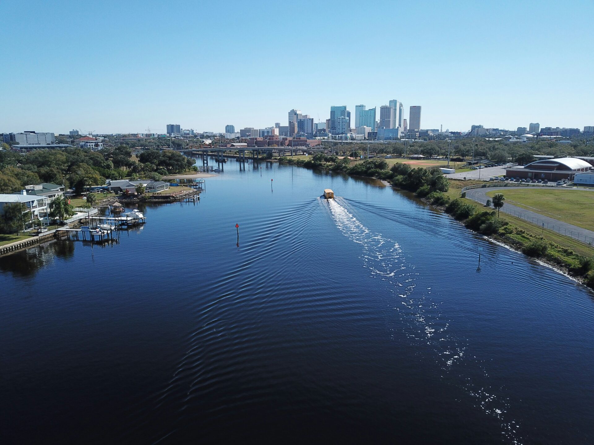 Aerial view of the winding Hillsborough River cutting through green landscapes in Tampa