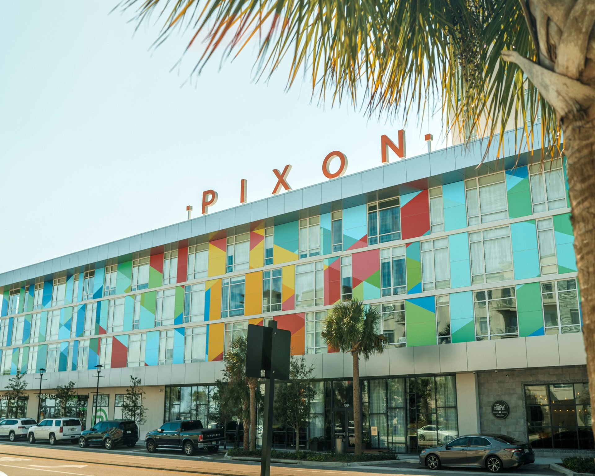The colorful Pixon mixed‑use building at Lake Nona Town Center