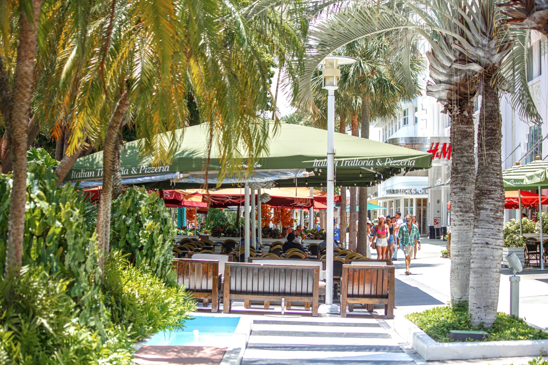 A bustling outdoor dining scene along Lincoln Road in Miami Beach