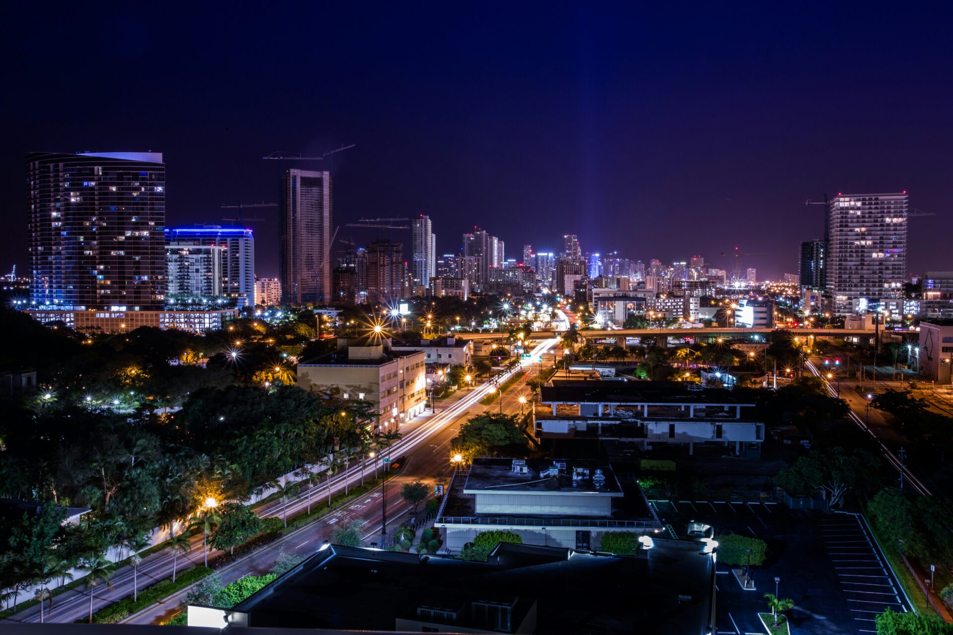 The Miami skyline featuring modern high-rise buildings and skyscrapers clustered along the waterfront