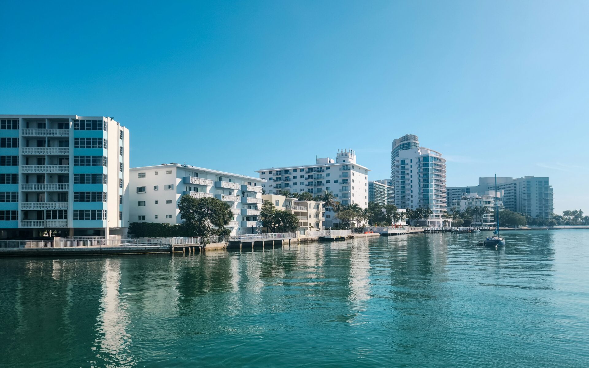 Biscayne Bay with its serene blue waters and several luxurious buildings along the coastline