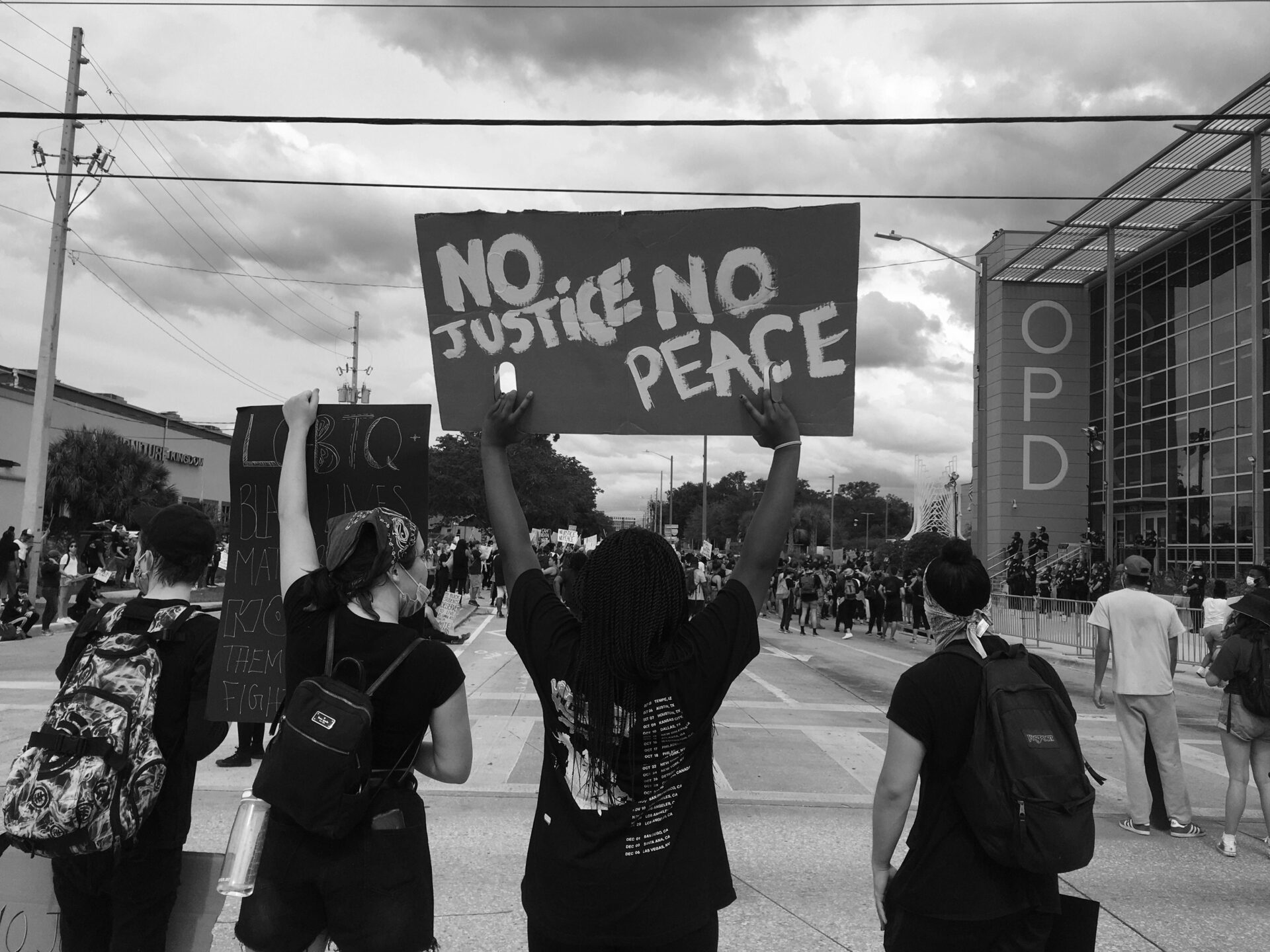 Community members of all ages united at an Orlando LGBTQ+ rally