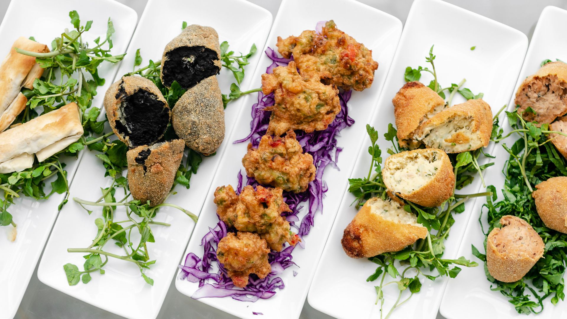 Petiscos are small, savory dishes served in Portugal, similar to the concept of tapas in Spain, and are a key part of Portuguese gastronomy. 