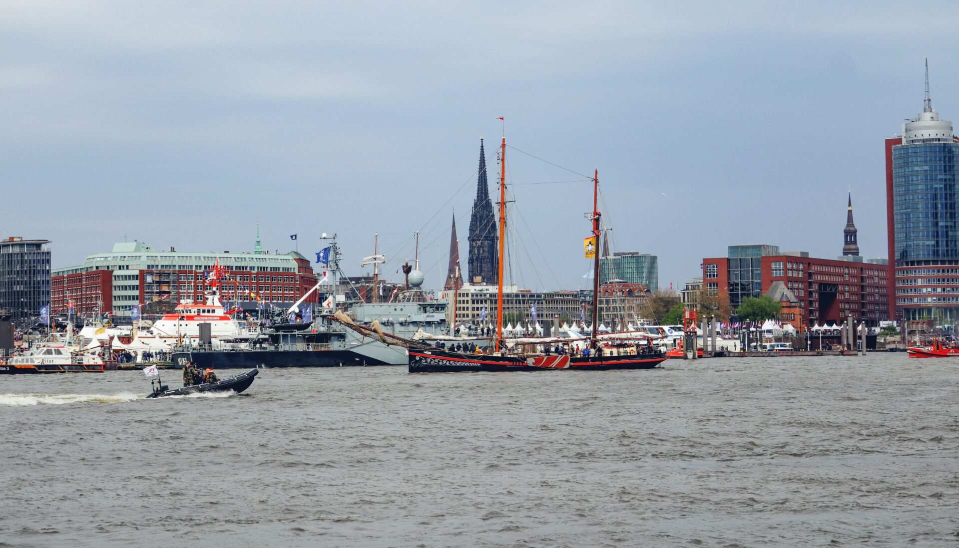 Colorful ships line the docks during the Hafengeburtstag festival 