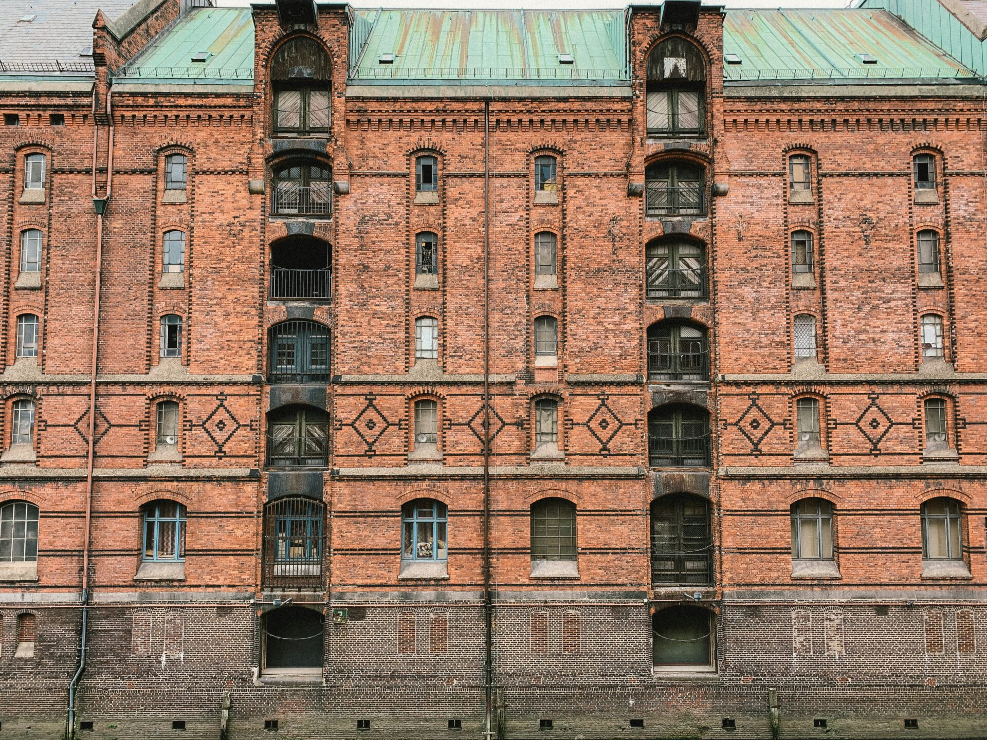 A towering red-brick warehouse in Speicherstadt