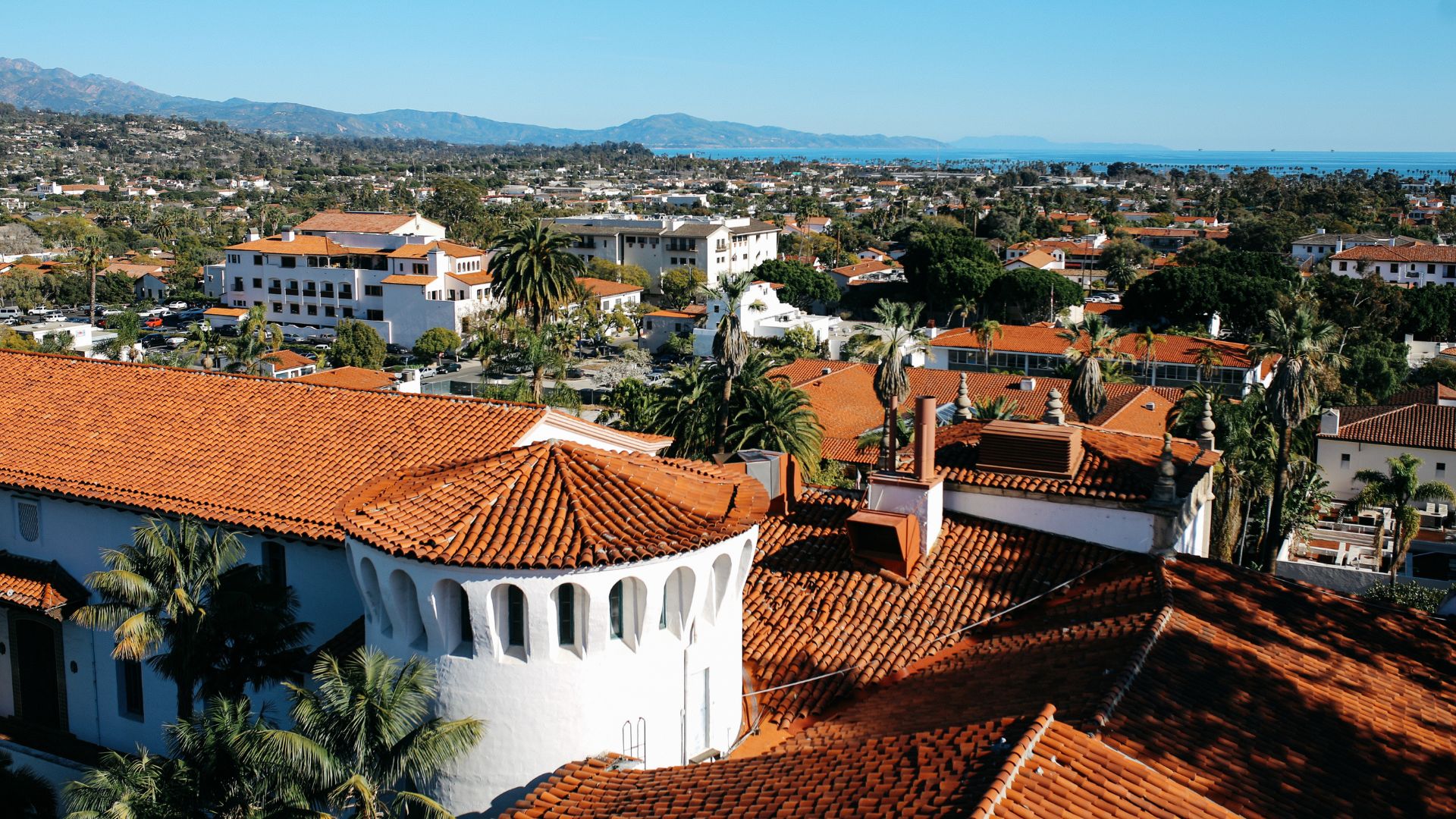 The image prominently features the Santa Barbara County Courthouse in Santa Barbara, California. 