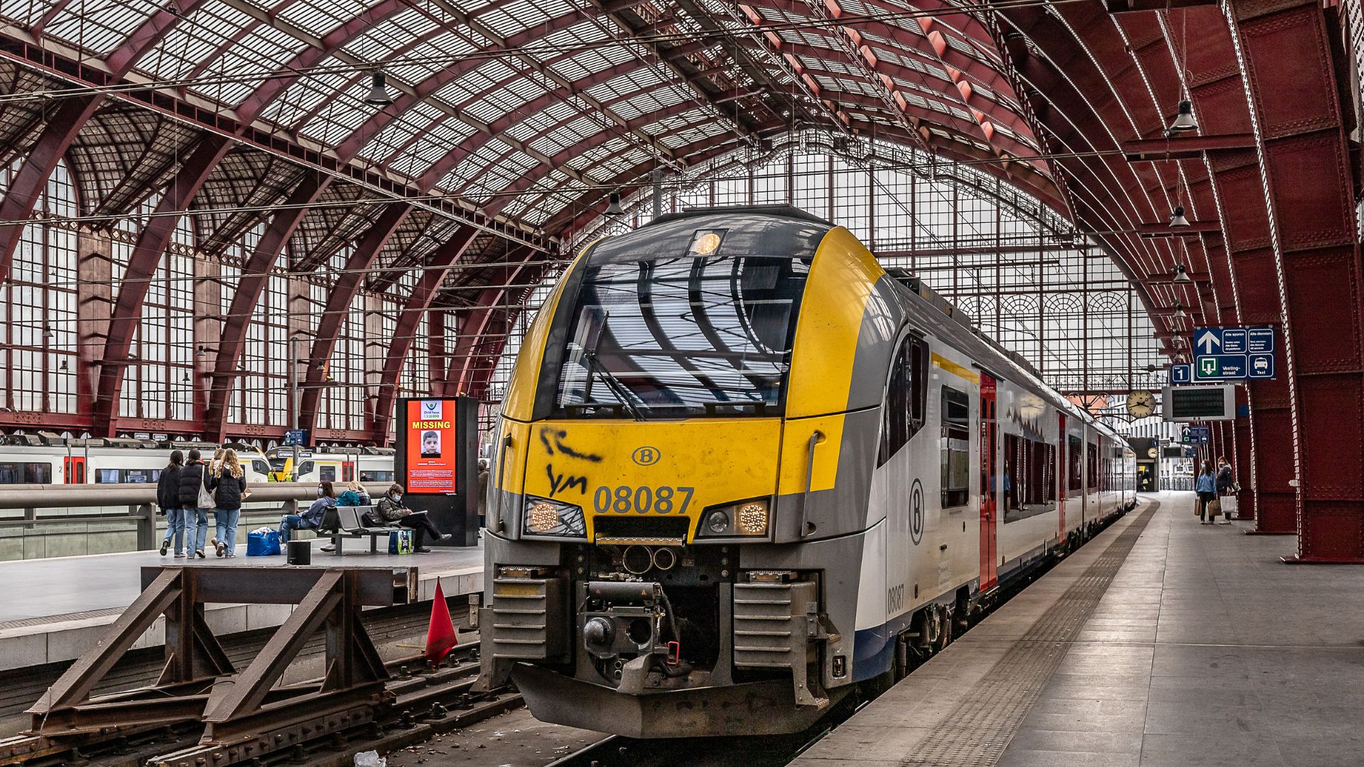 A yellow train in São Bento Railway Station in Porto, Portugal.