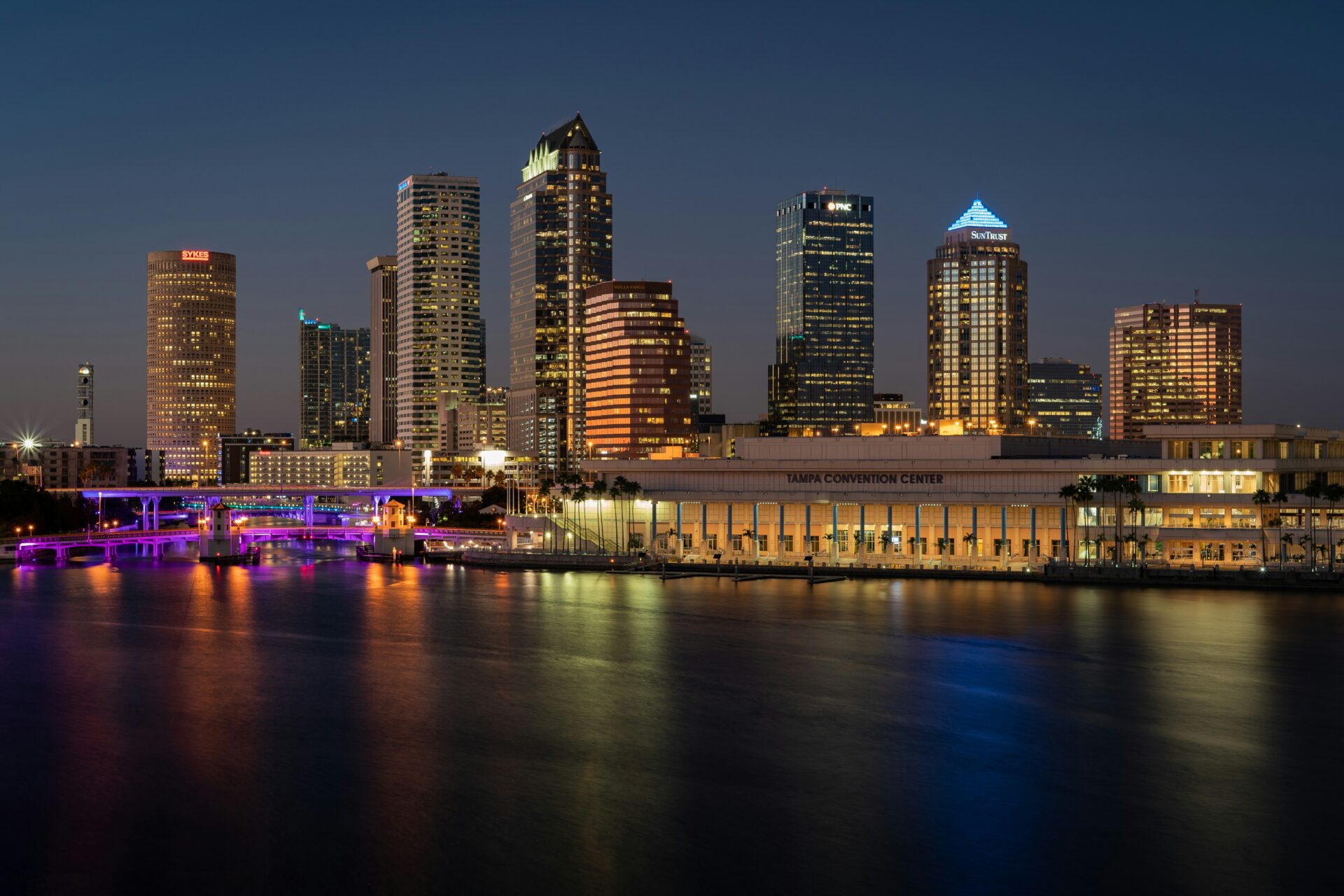 Christmas lights illuminate the Tampa skyline at night