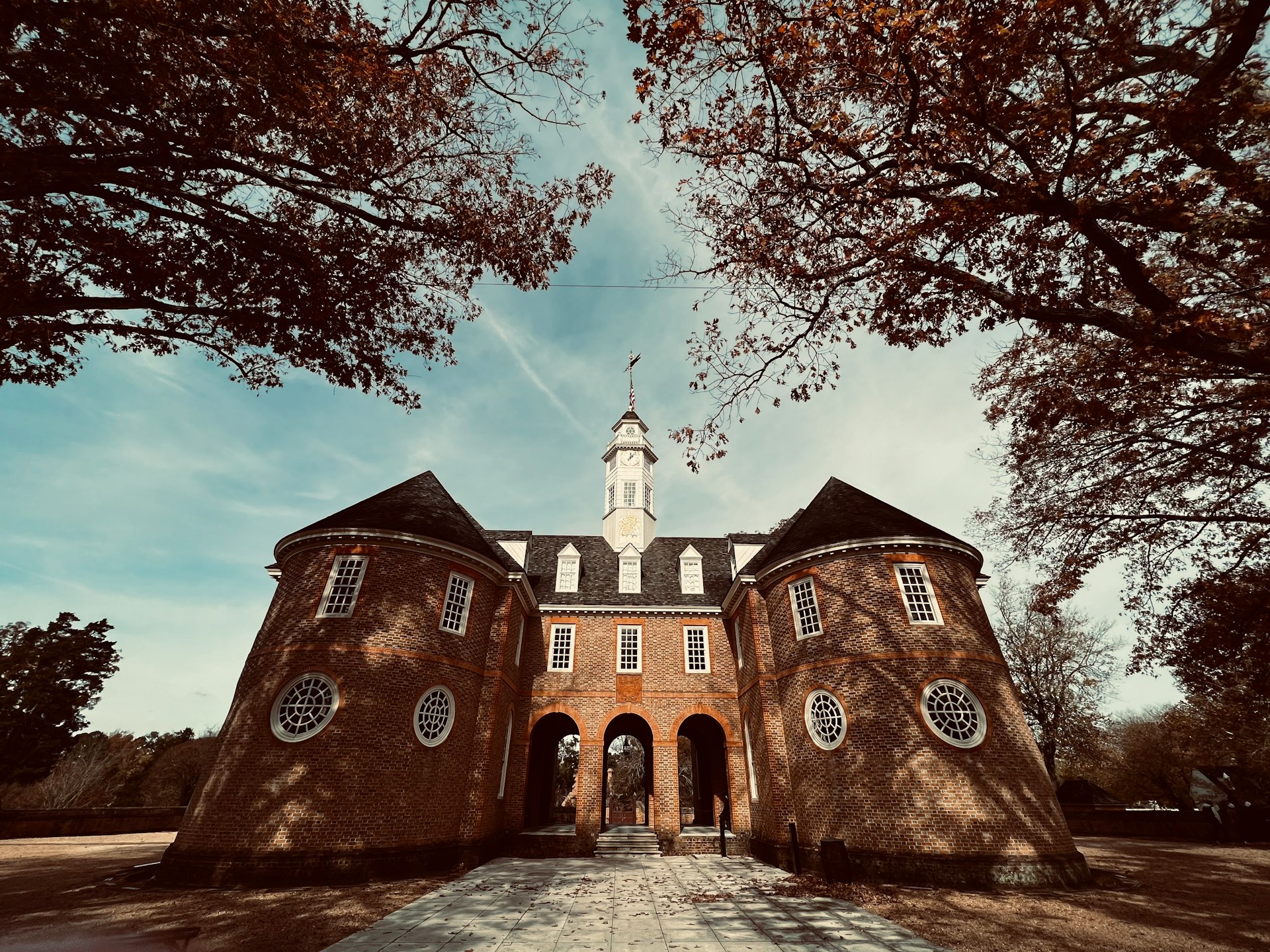 Historic Colonial Williamsburg with cobblestone streets and restored 18th-century buildings