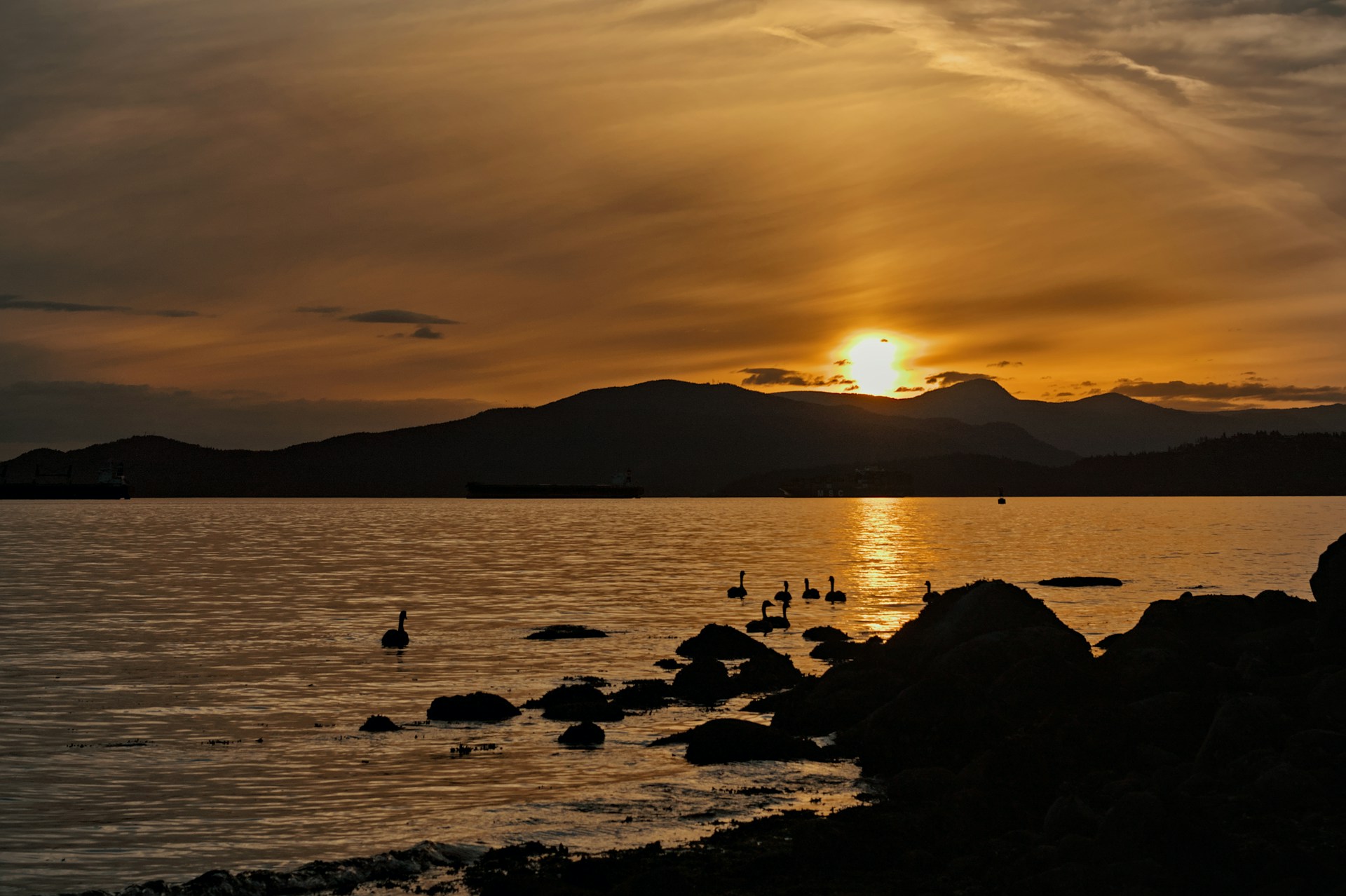 Vibrant sunset over English Bay in Vancouver