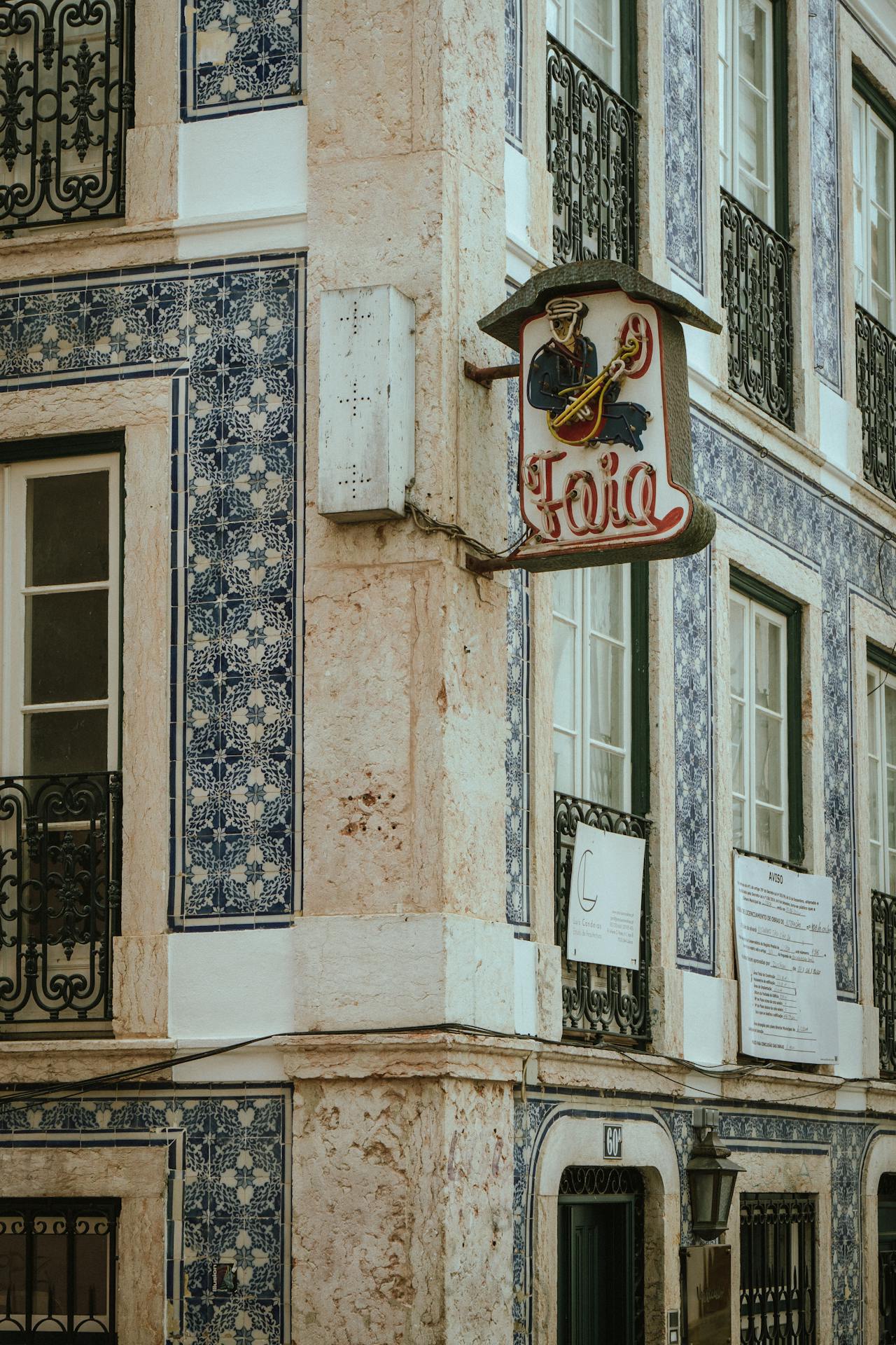 Exterior wall covered in blue-and-white Portuguese tiles (azulejos) in Fado