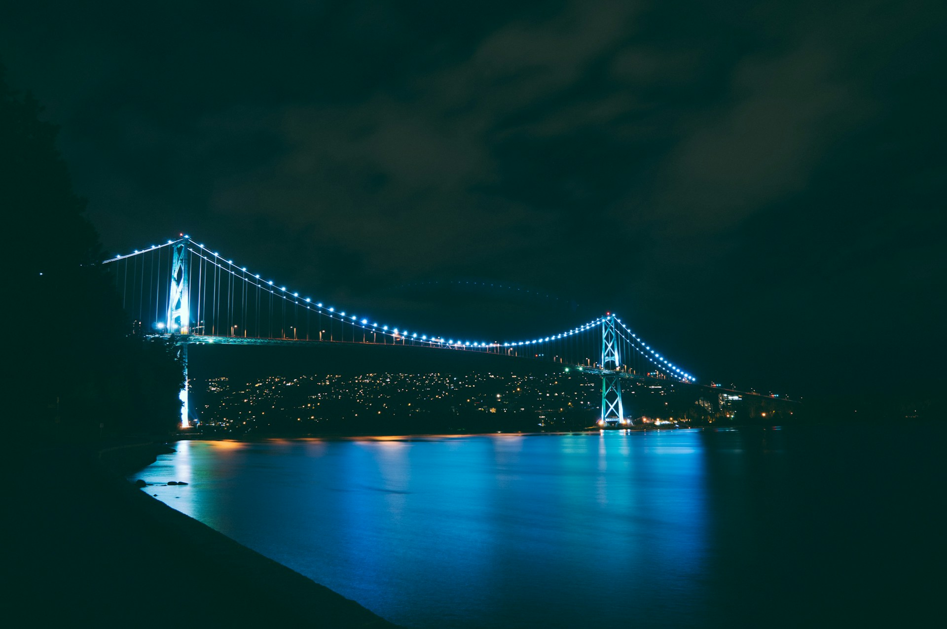 Lions Gate Bridge illuminated at night