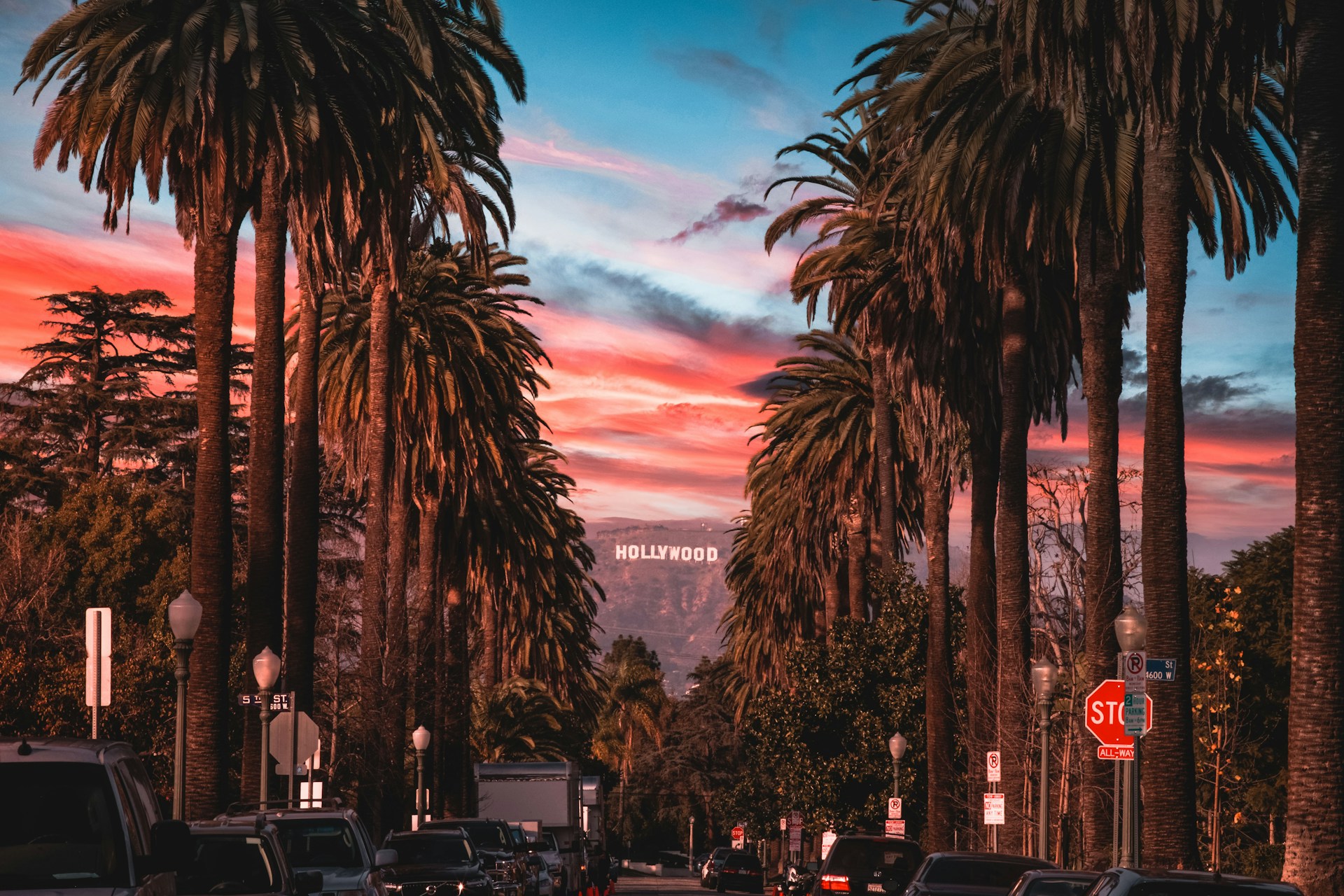 A sweeping view of Los Angeles, with the iconic Hollywood sign perched on the hills in the background.