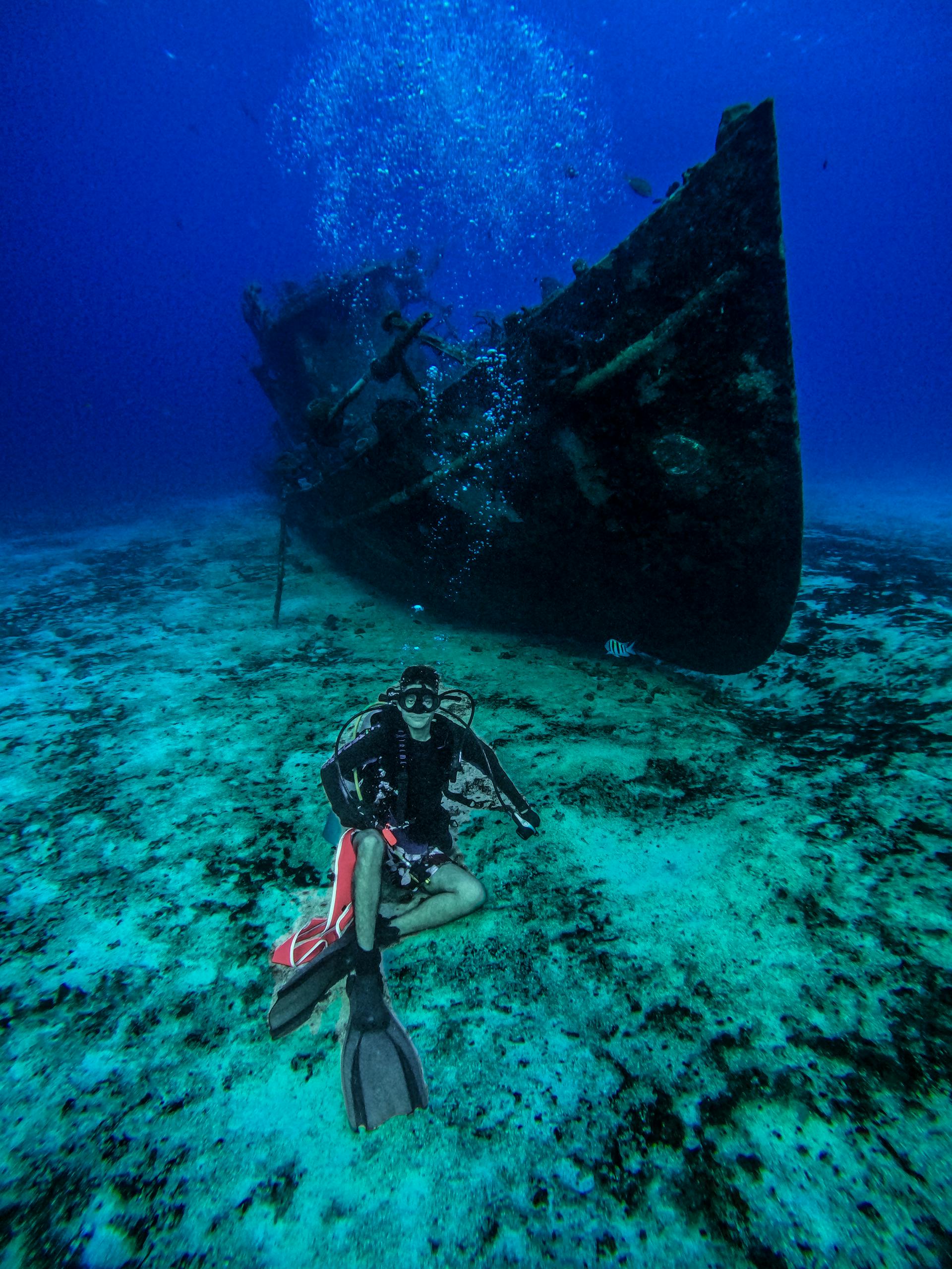 Weathered, decaying shipwreck off the coast of Cozumel