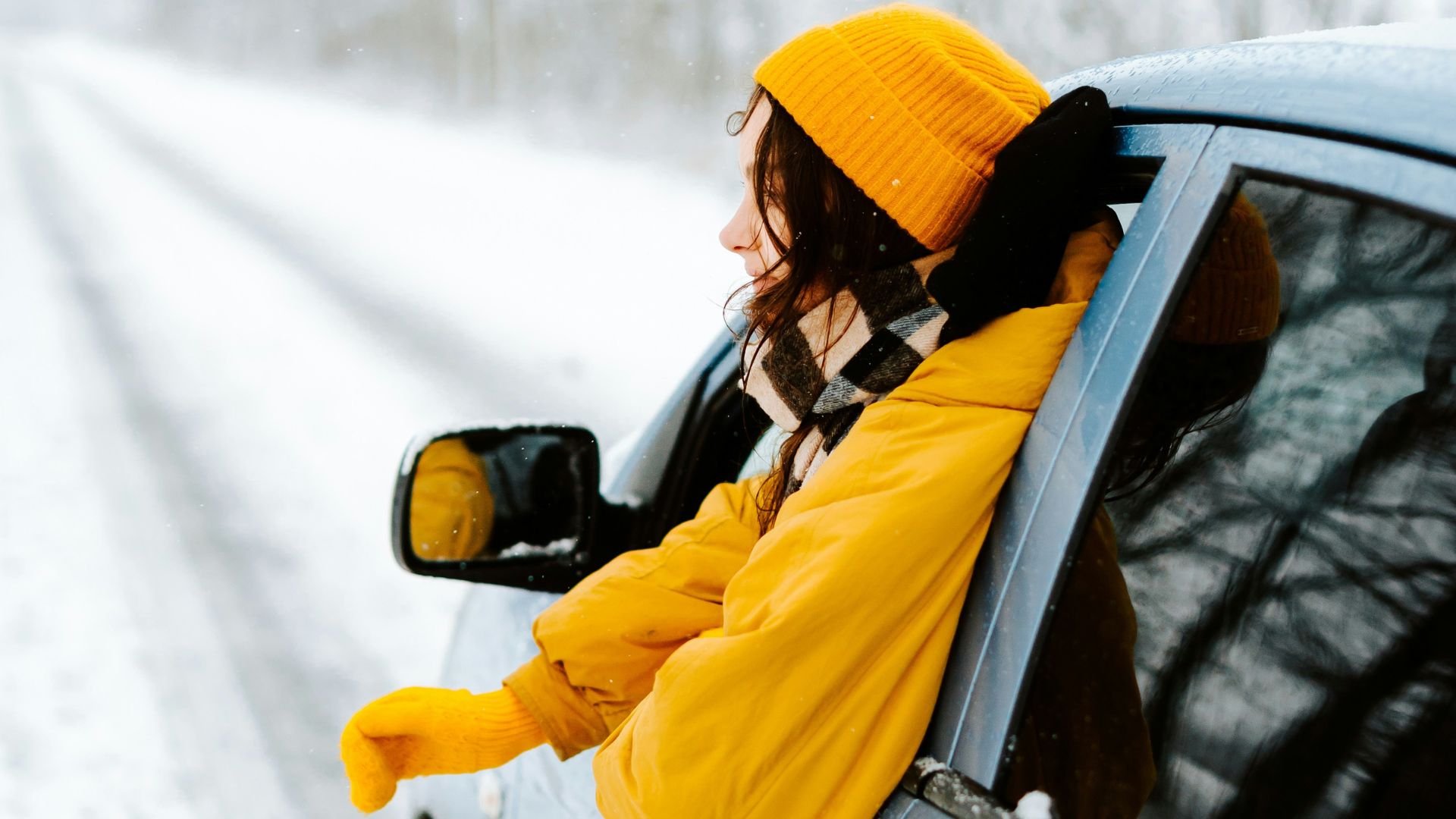 A woman on a winter road trip