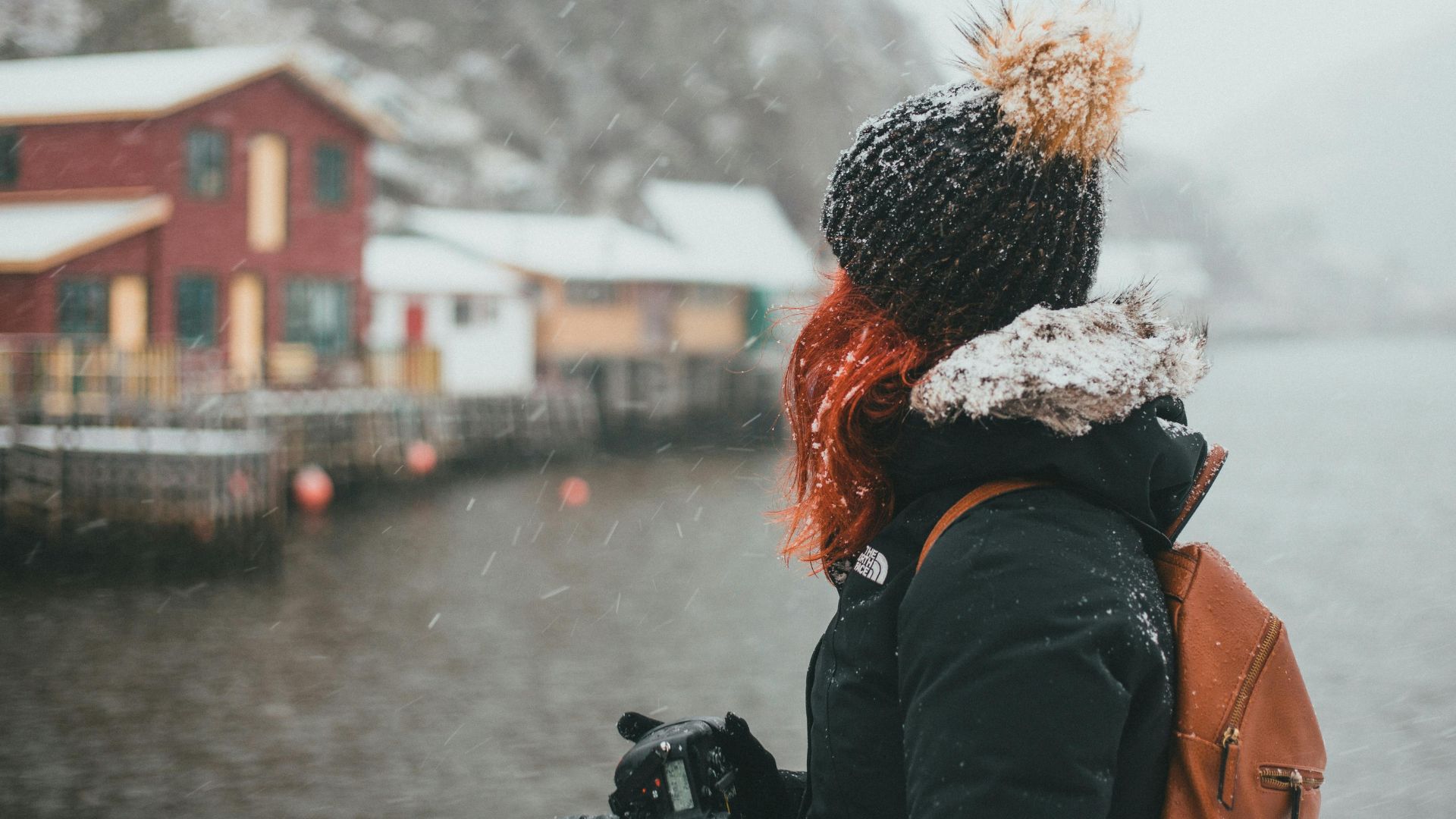 A woman travelling during winter
