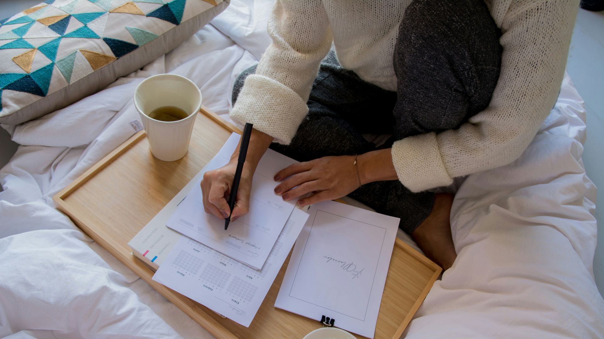 A woman writing journal