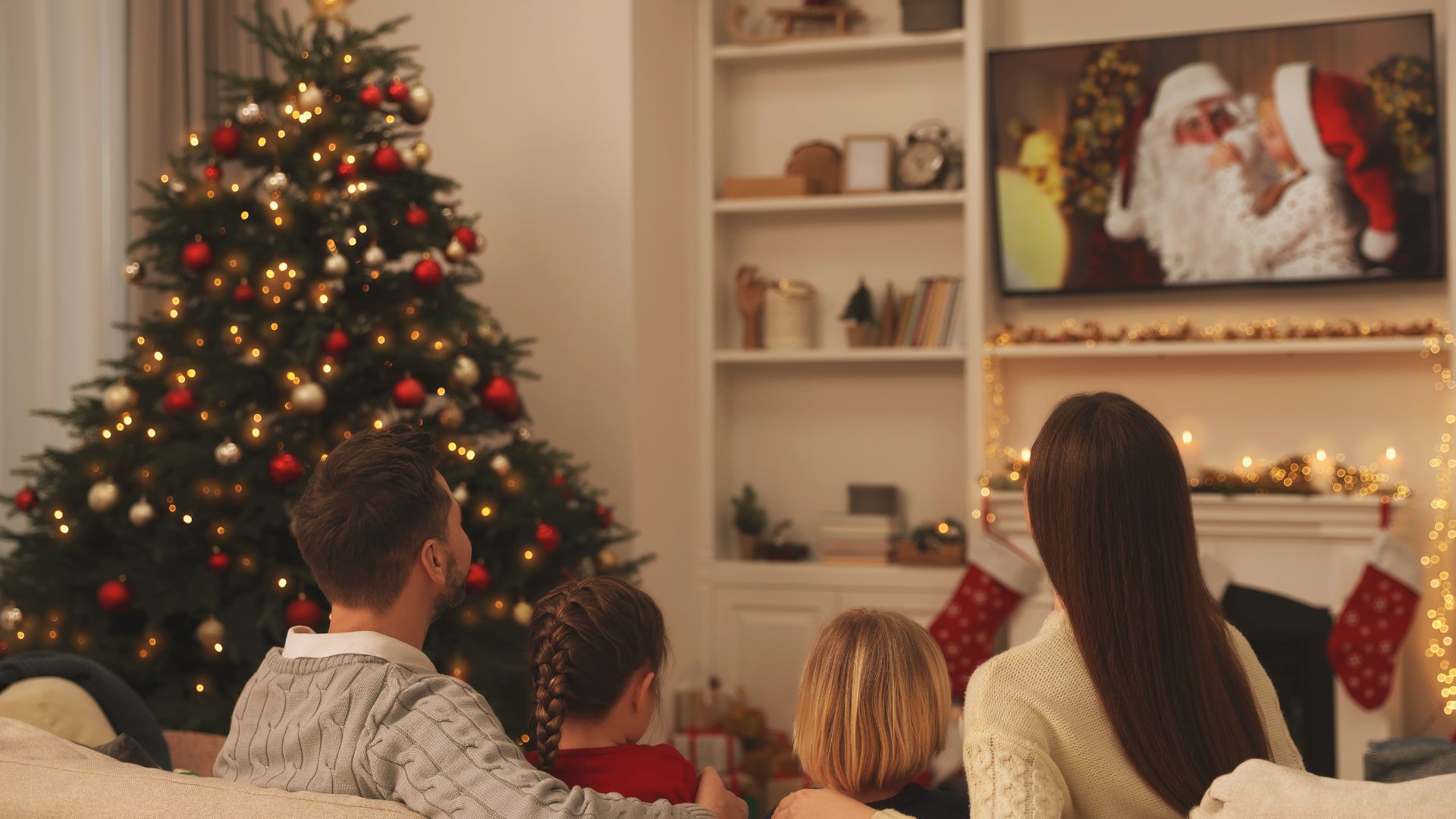 Family watching a christmas movie marathon