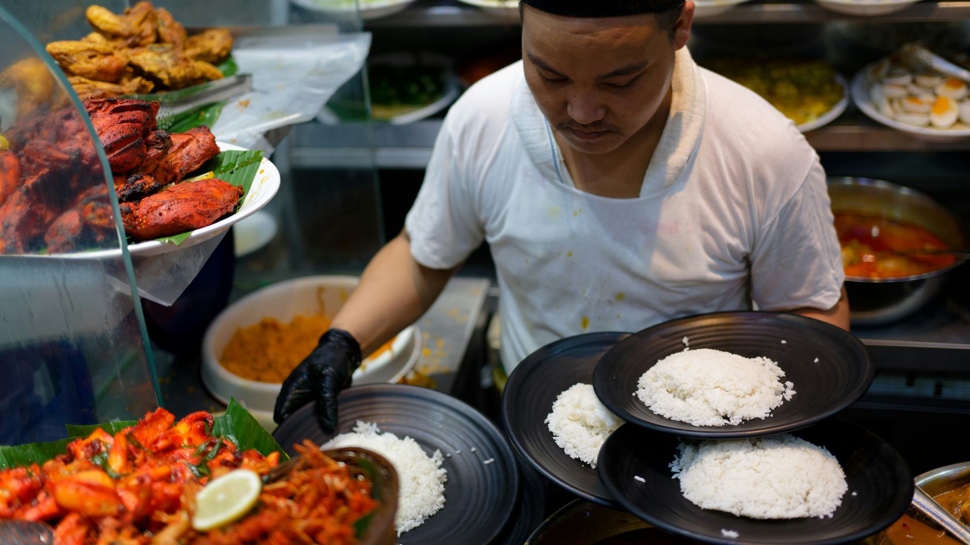 Image depicts a Nasi Kandar stall, a type of food establishment commonly found in Malaysia