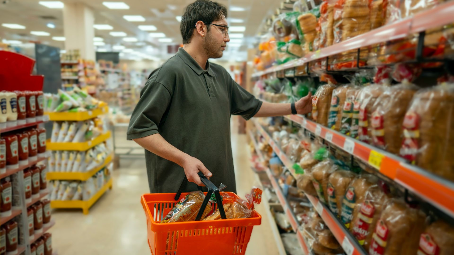 A man at a grocery/supermarket.