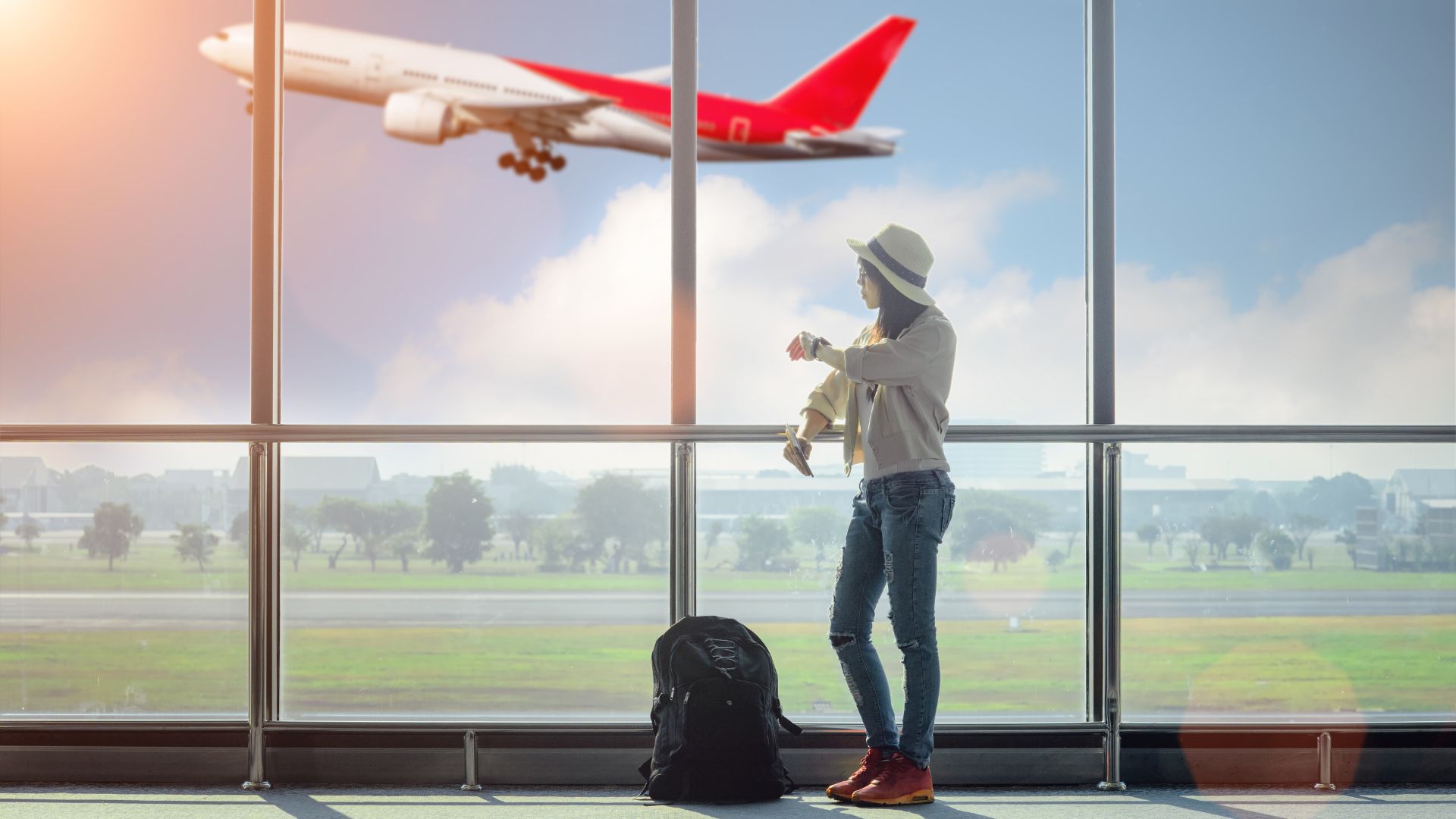 A woman standing at the airport