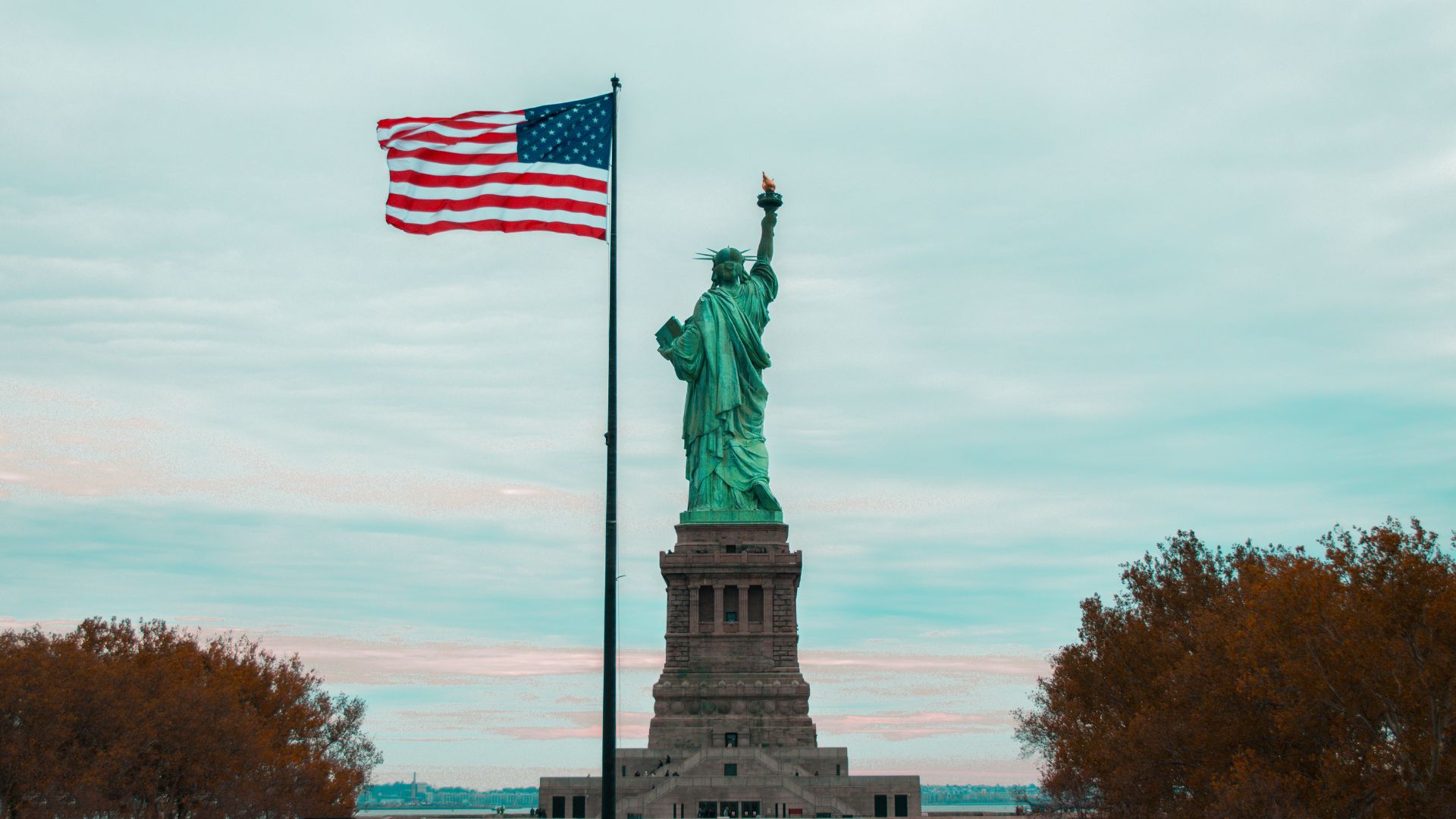 Statue of Liberty and the USA flag.