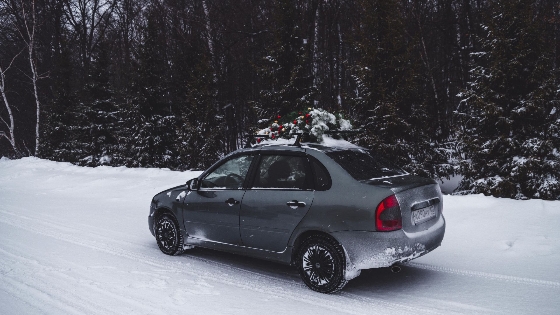 A black car on a snowy road