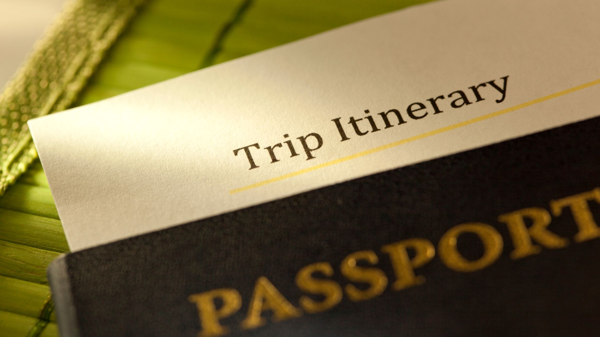 A passport and a Travel Itinerary